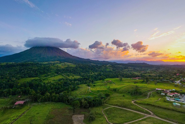 Country side with mountain in backgroups. Green grass